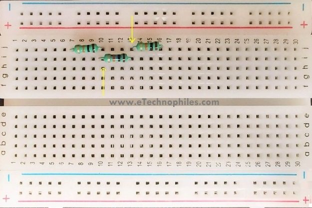 Resistors connected in series on a breadboard